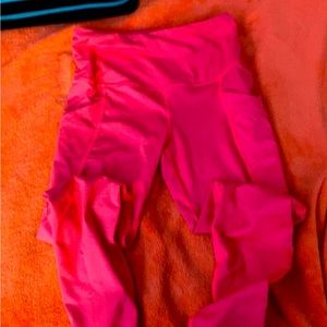 Hot pink small leggings.